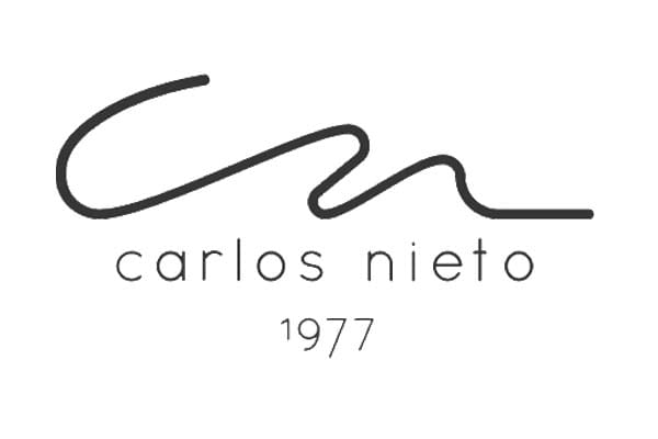 Logo Carlos Nieto marca de moda cliente de fotografía editorial