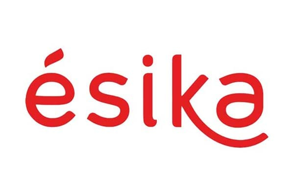 Logo Ésika cliente de fotografía cosmética