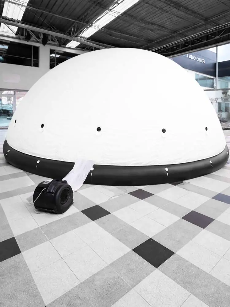 Estudio fotográfico con domo de iluminación inflable blanco